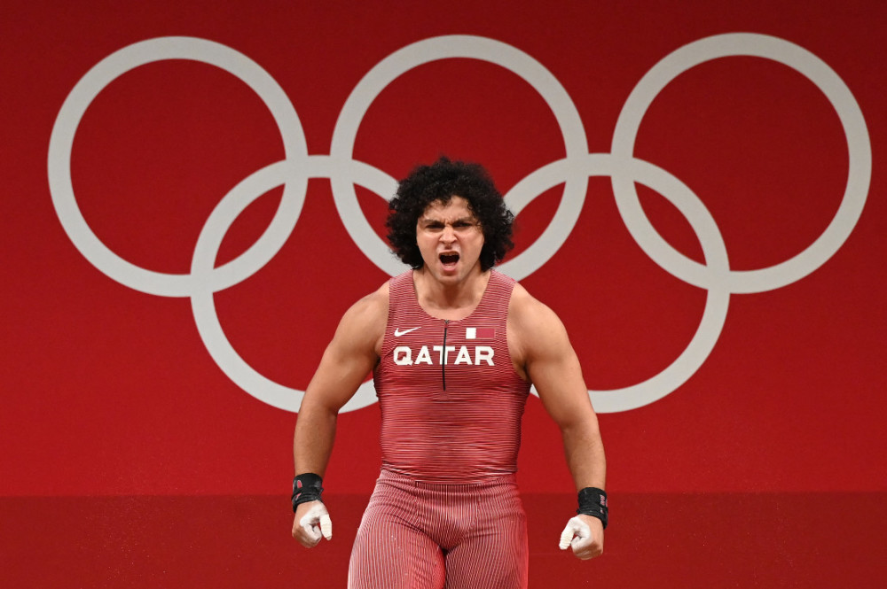 关于意大利举重运动员获得金牌成功的信息 关于意大利举重运动员获得金牌成功的信息